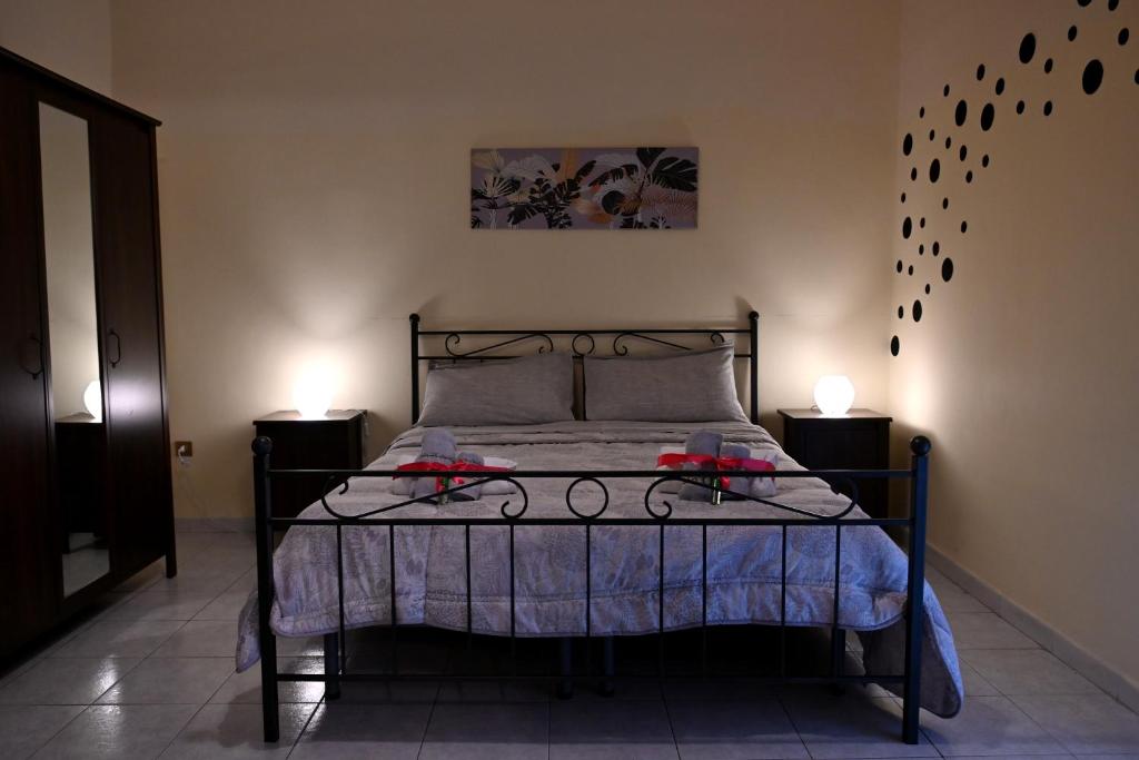 Postel nebo postele na pokoji v ubytování B&B a Capua - I PORTICI del centro