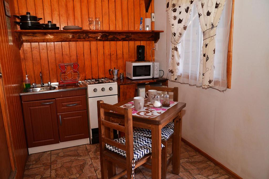 Kuchyň nebo kuchyňský kout v ubytování El Encanto del Manzano & Espacio Vittalia Spa