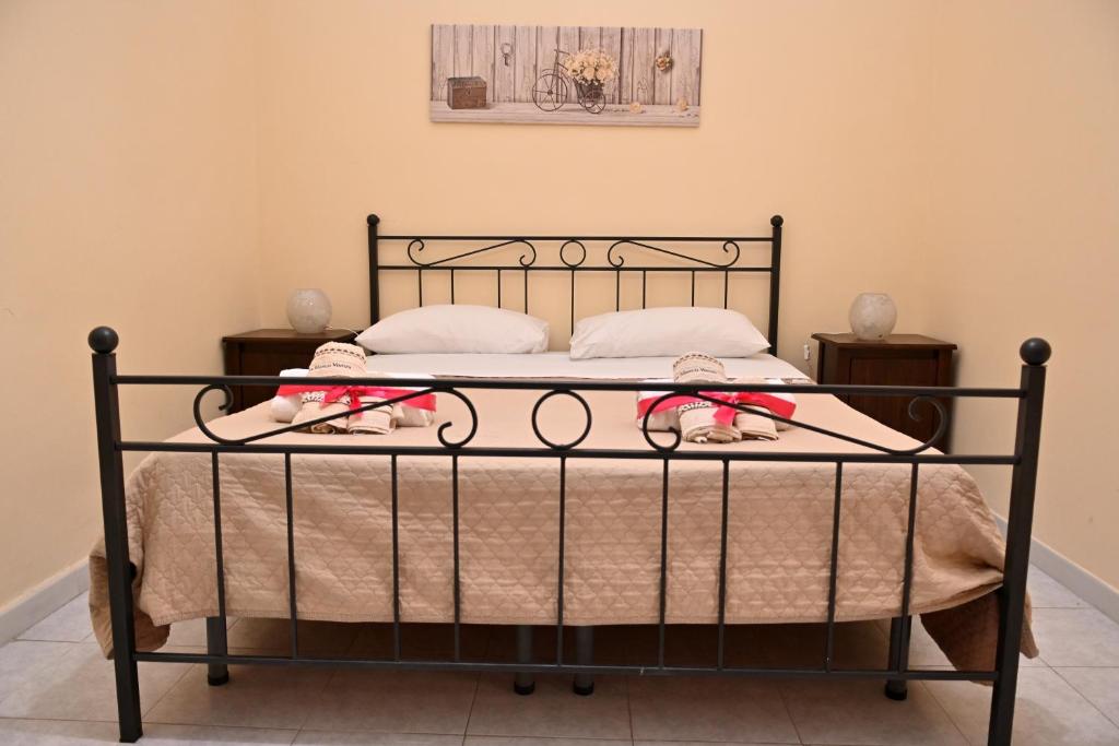 Postel nebo postele na pokoji v ubytování B&B a Capua - I PORTICI del centro