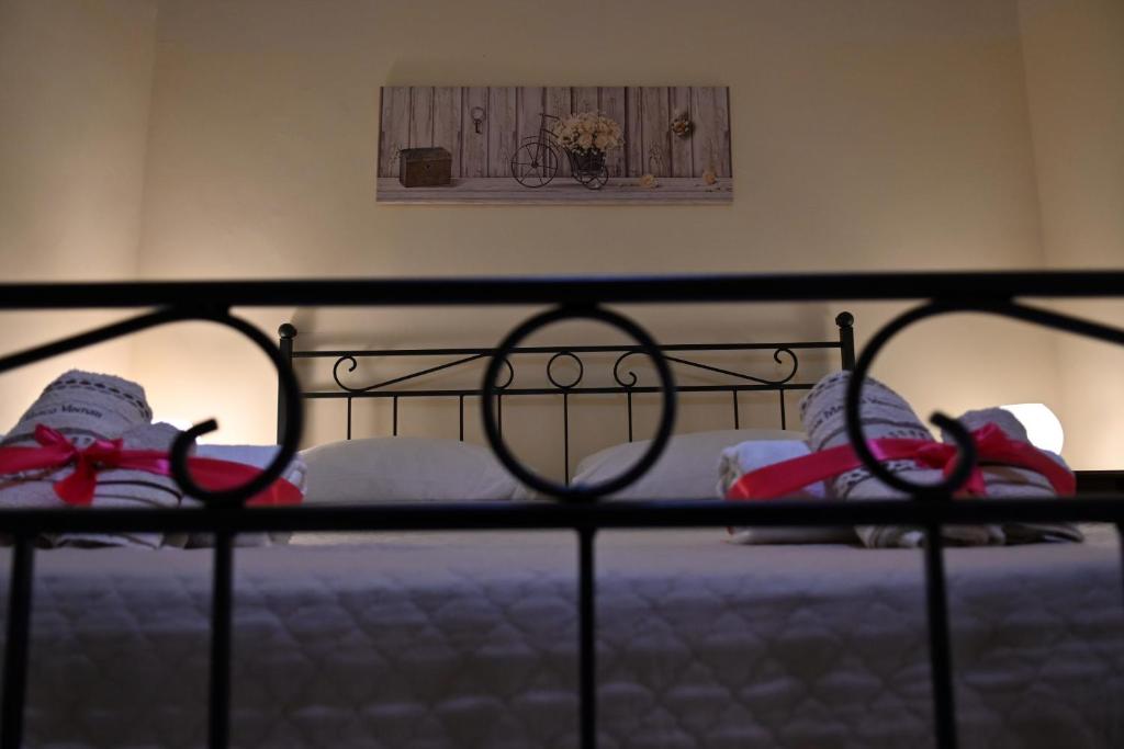 Postel nebo postele na pokoji v ubytování B&B a Capua - I PORTICI del centro