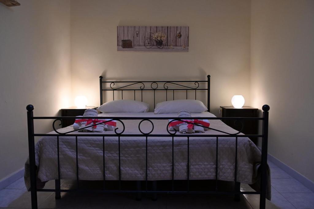 Postel nebo postele na pokoji v ubytování B&B a Capua - I PORTICI del centro