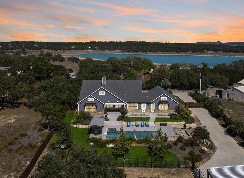 an aerial view of a house with a swimming pool at Tres A Lake Retreat in Canyon Lake