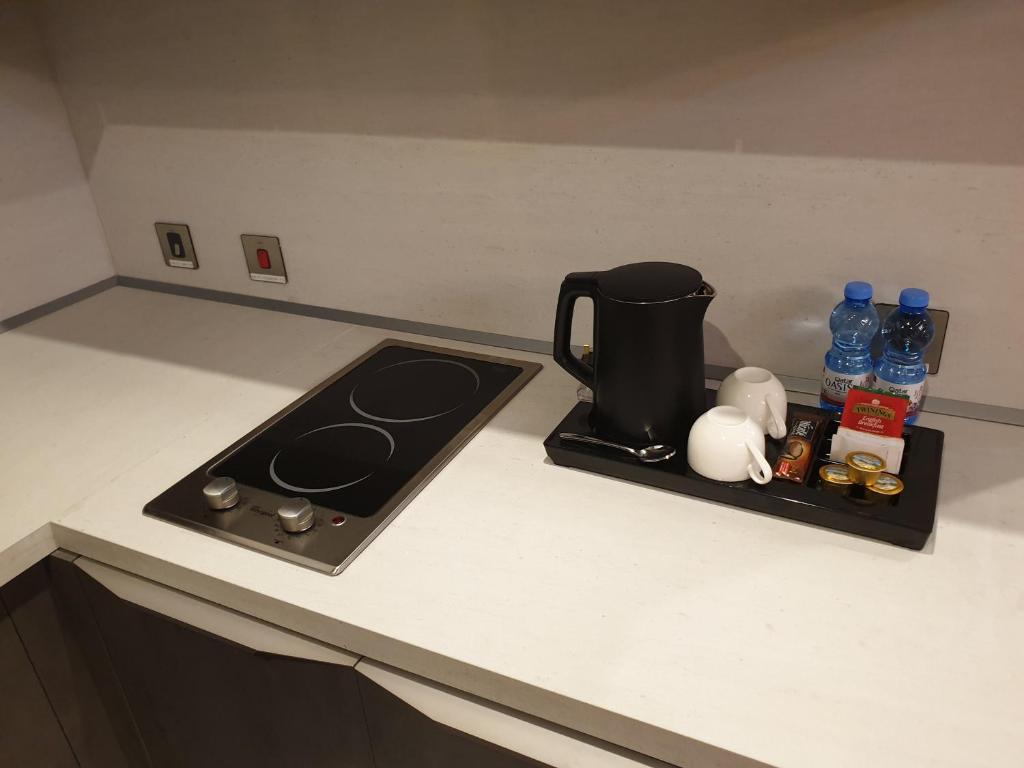 Dapur atau dapur kecil di Terminal Inn Al Mansoura
