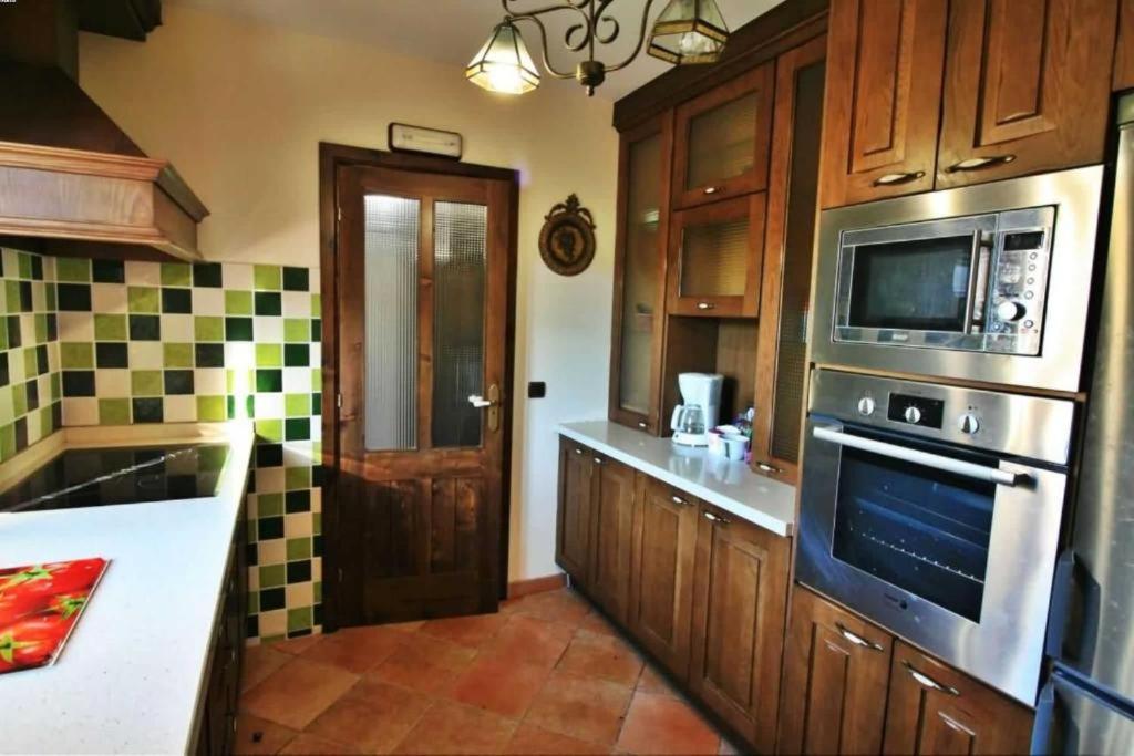 Kuchnia lub aneks kuchenny w obiekcie Casa Os Castelos