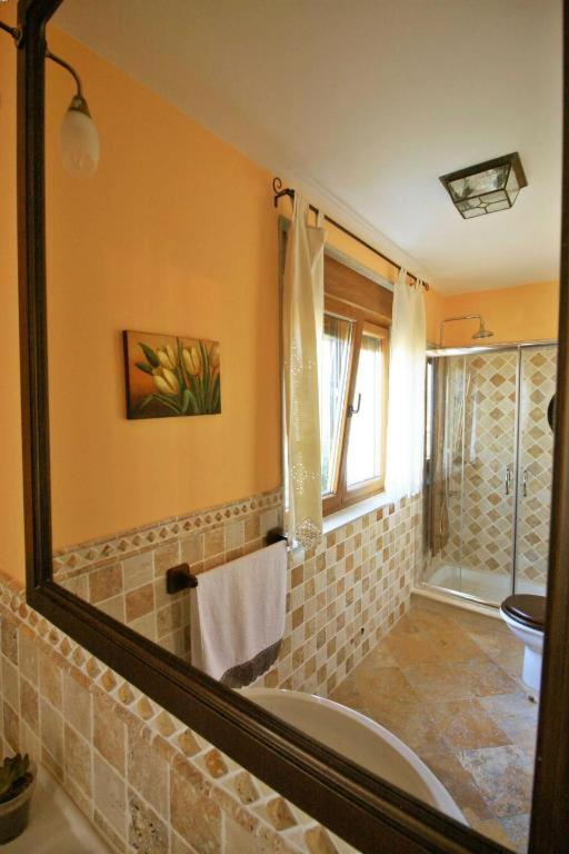 Łóżko lub łóżka w pokoju w obiekcie Casa Os Castelos
