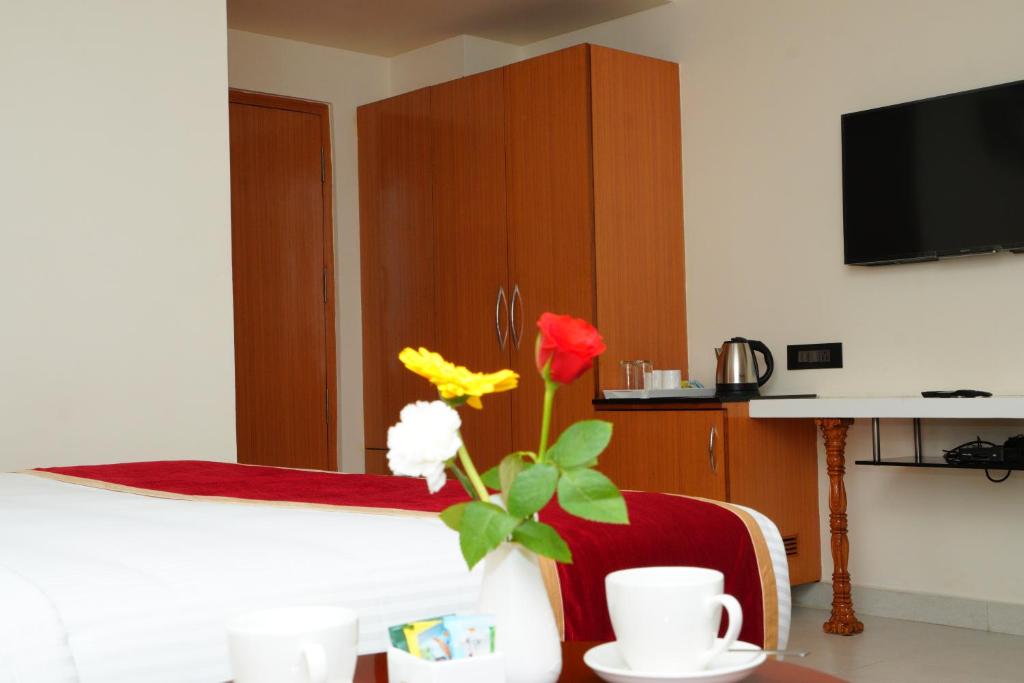 TV a/nebo společenská místnost v ubytování ECONOH HOTEL