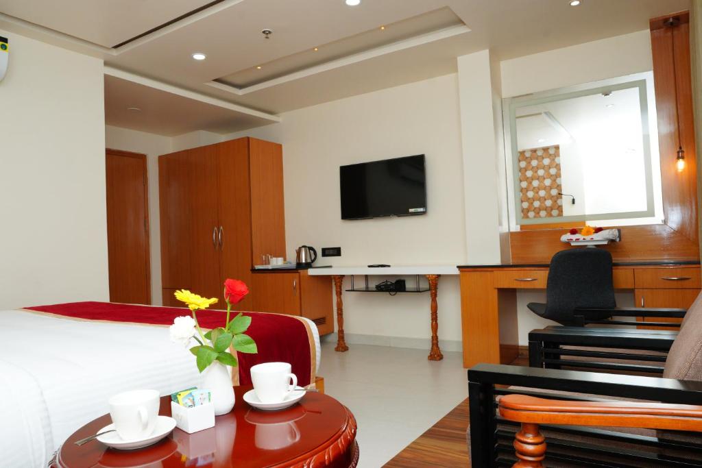 TV a/nebo společenská místnost v ubytování ECONOH HOTEL