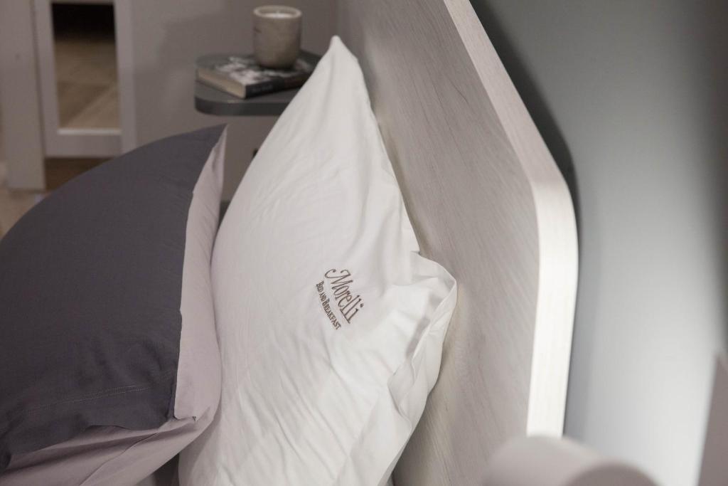 Postel nebo postele na pokoji v ubytování B&B Morelli Home