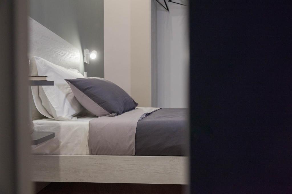 Postel nebo postele na pokoji v ubytování B&B Morelli Home