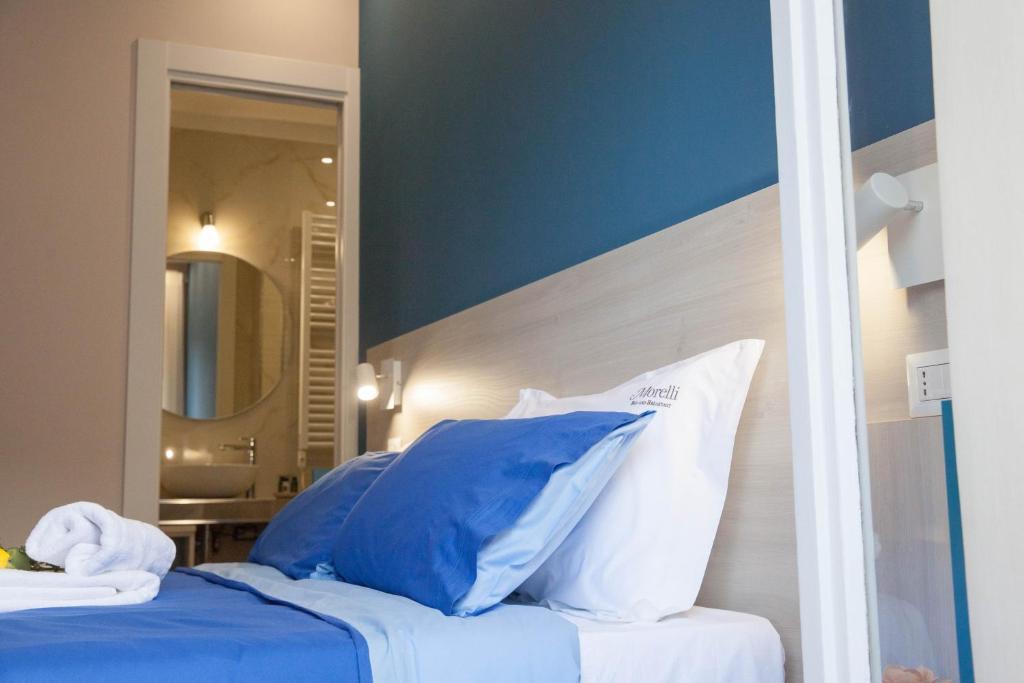 Postel nebo postele na pokoji v ubytování B&B Morelli Home