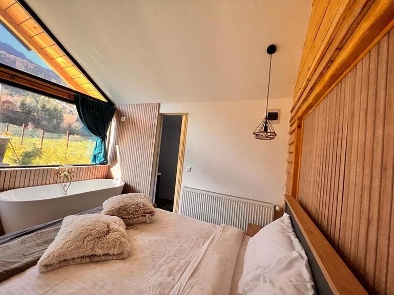 Postel nebo postele na pokoji v ubytování View Piatra Craiului