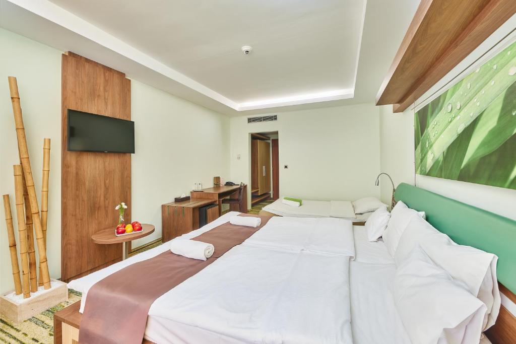 Postel nebo postele na pokoji v ubytování Vital Hotel Nautis