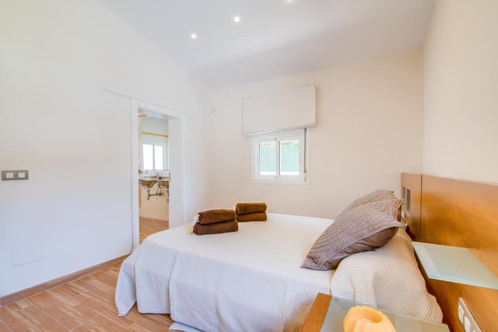 Posteľ alebo postele v izbe v ubytovaní Ideal Property Mallorca - Romani Can Picafort