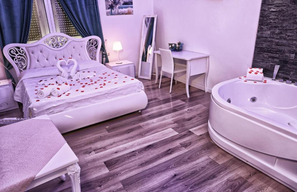 Łóżko lub łóżka w pokoju w obiekcie Messina41 Hotel