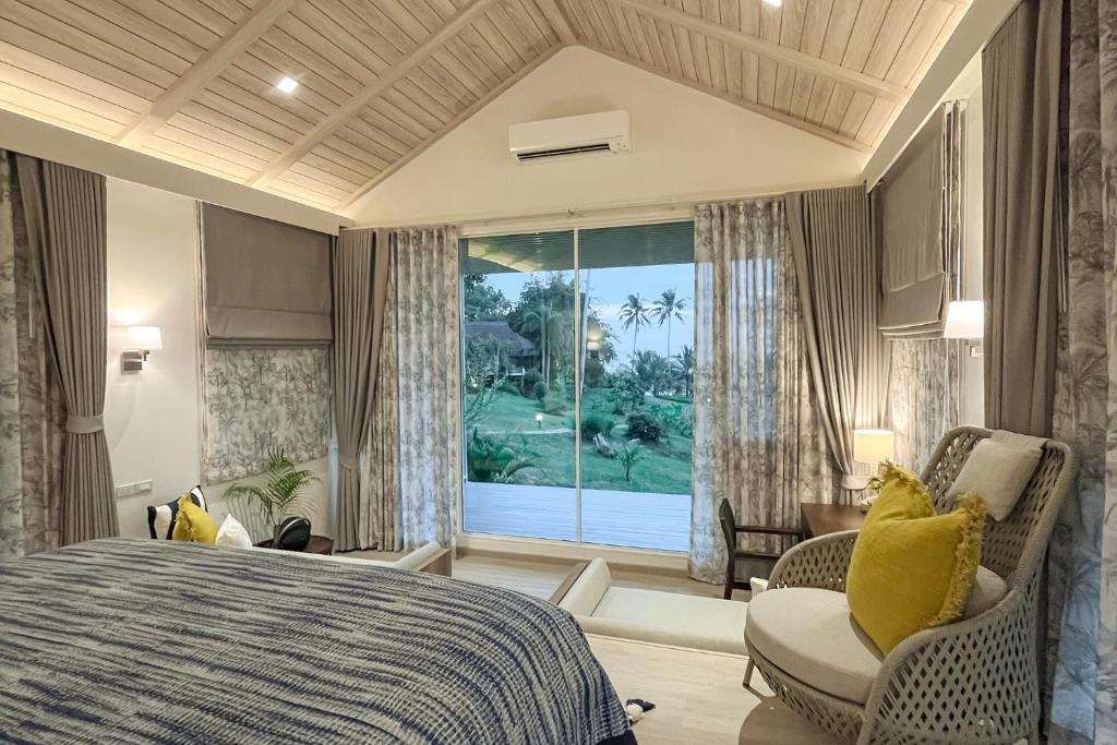 Postel nebo postele na pokoji v ubytování Shantaa Resort, Kohkood