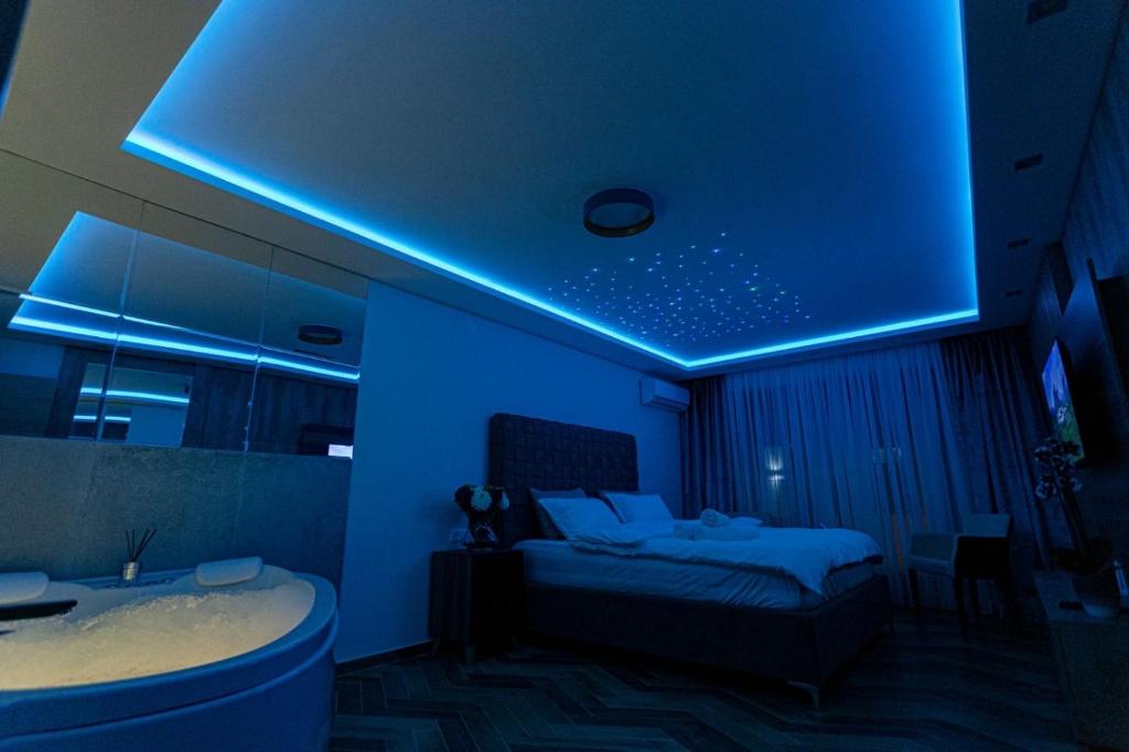 Postel nebo postele na pokoji v ubytování Perla Lux apartmani