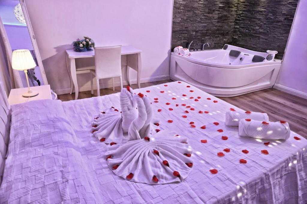 Łóżko lub łóżka w pokoju w obiekcie Messina41 Hotel