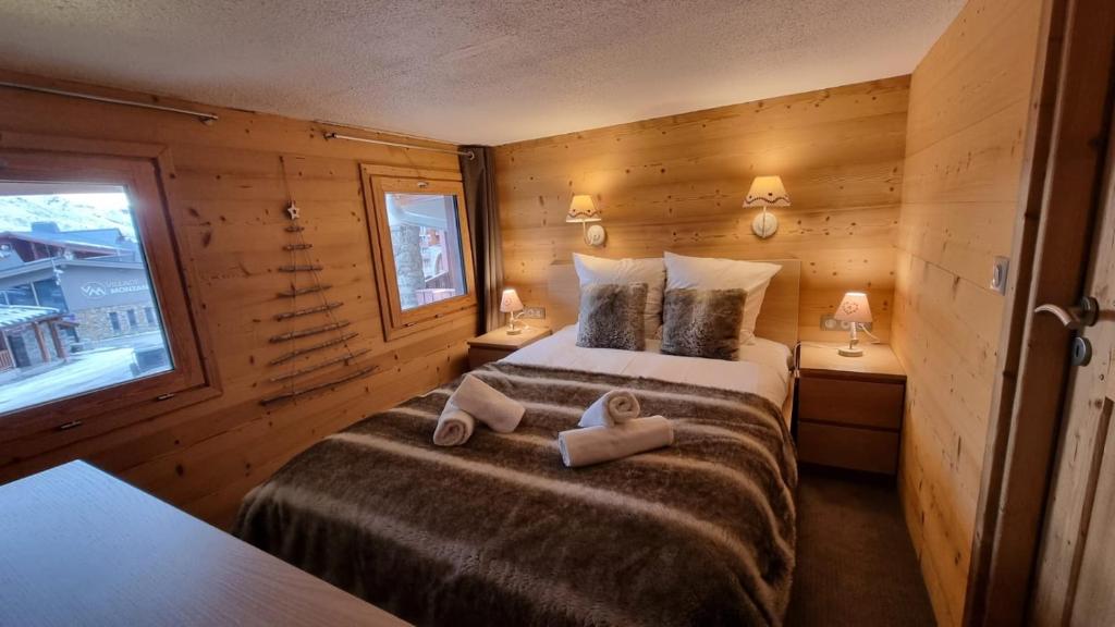 Postel nebo postele na pokoji v ubytování So cosy Val Thorens