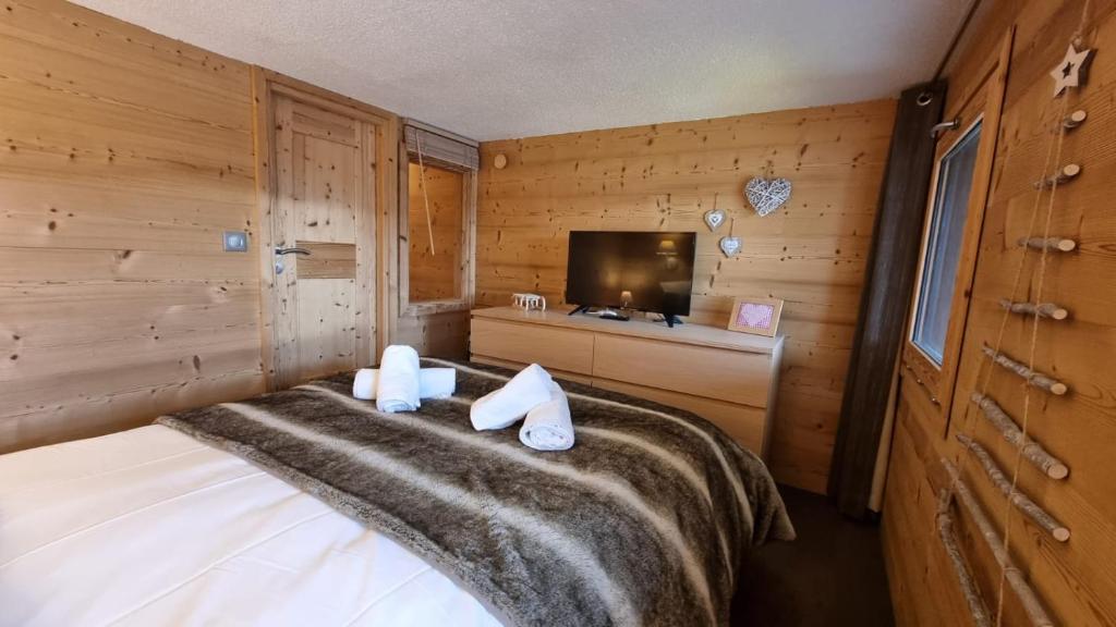 Postel nebo postele na pokoji v ubytování So cosy Val Thorens