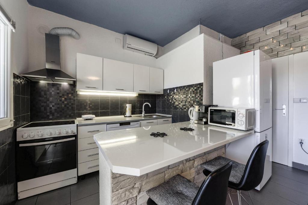 Kuchnia lub aneks kuchenny w obiekcie Diva Apartment