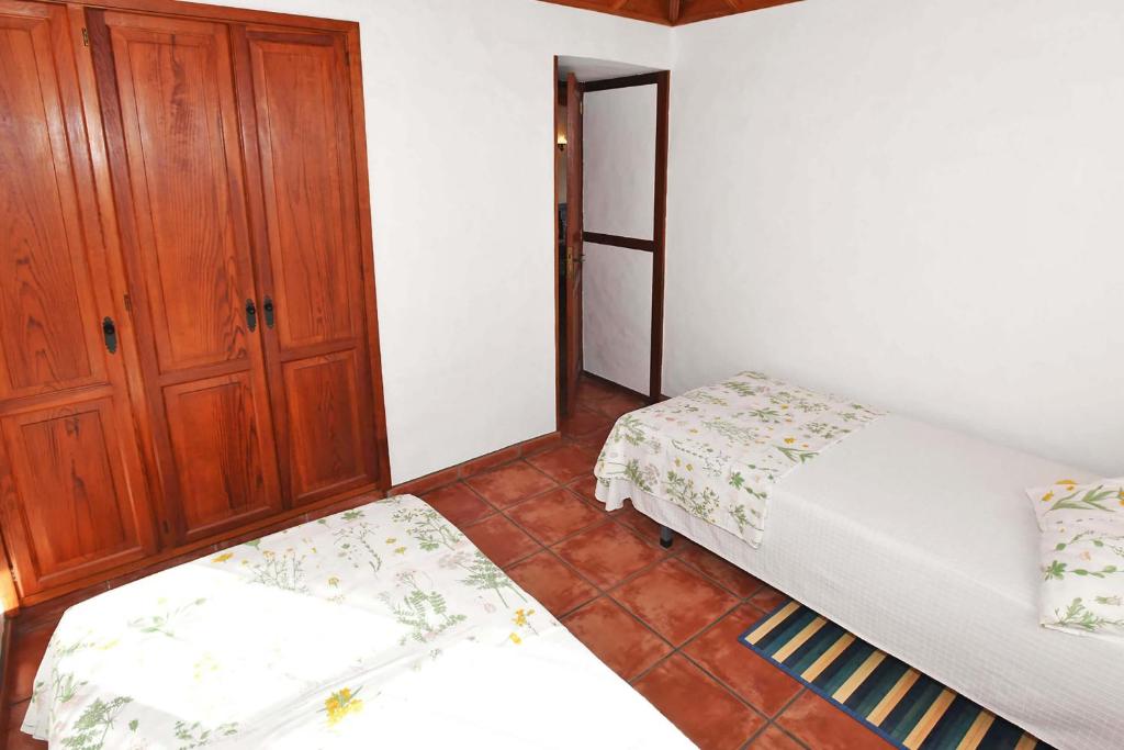 Posteľ alebo postele v izbe v ubytovaní Casa Rincón Palmero