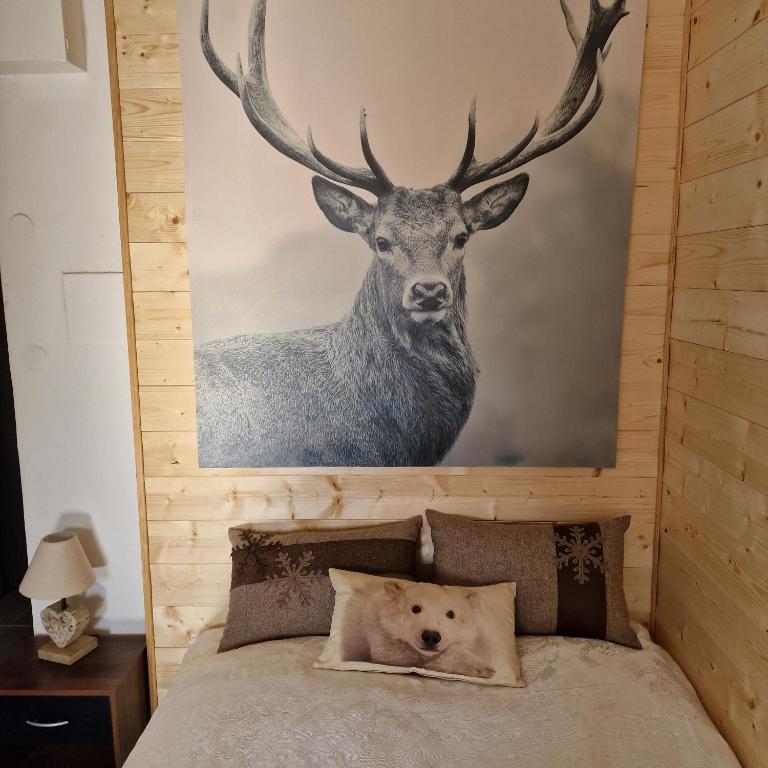 Postel nebo postele na pokoji v ubytování font romeu