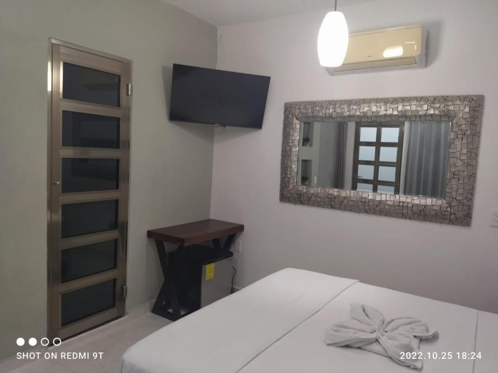 Postel nebo postele na pokoji v ubytování Casa Zazil
