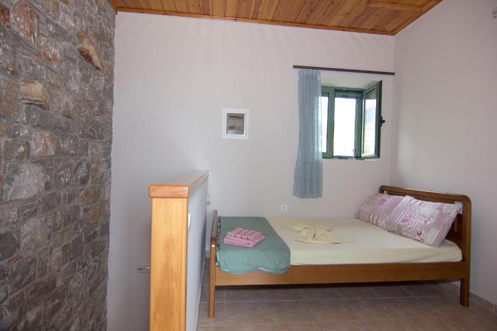 Postel nebo postele na pokoji v ubytování Mani Cosy View Maisonette