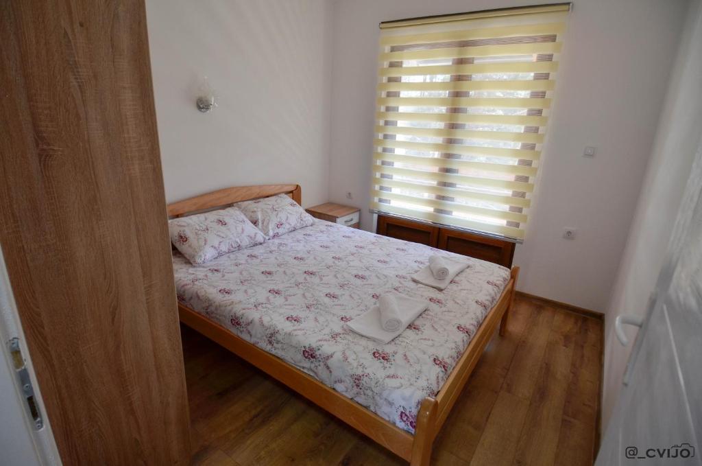 Postel nebo postele na pokoji v ubytování Apartman Sofija