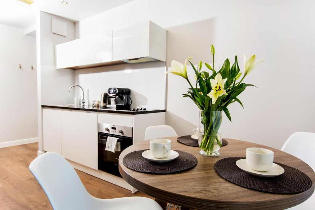 Kuchyňa alebo kuchynka v ubytovaní erApartments Oxygen Residence