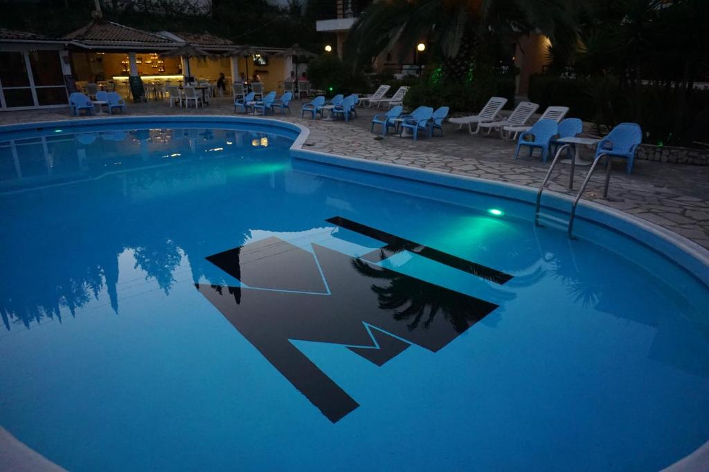 Bazén v ubytování Le Mirage Hotel nebo v jeho okolí