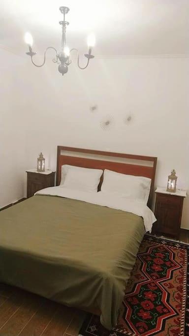 Postel nebo postele na pokoji v ubytování Ξενώνας Άνθεμις