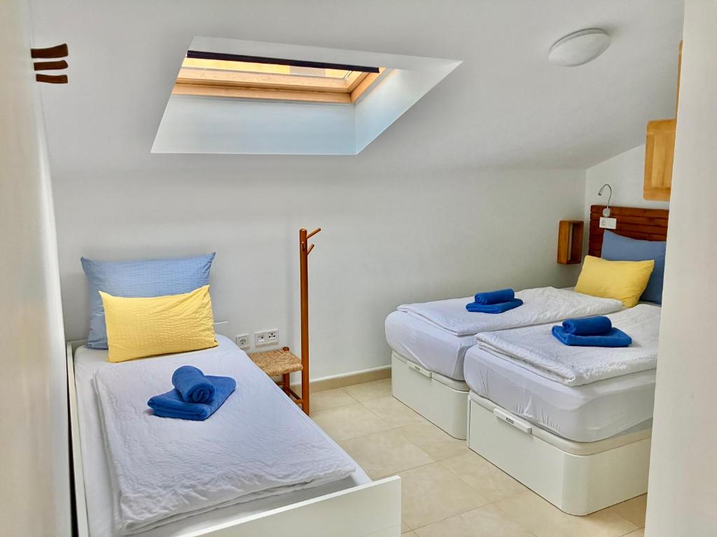 Posteľ alebo postele v izbe v ubytovaní Casa Al Sur Apartments