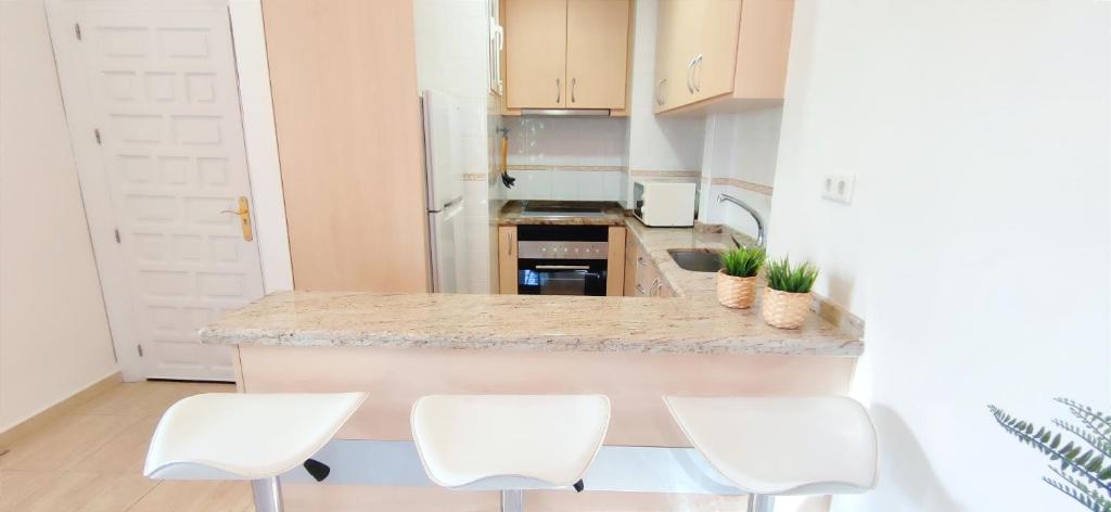 Kuchyňa alebo kuchynka v ubytovaní Apartamento La Felicidad II by DENIA COSTA