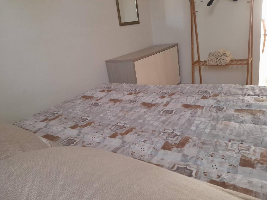 A bed or beds in a room at Musa Balbisiana Casa Citrus