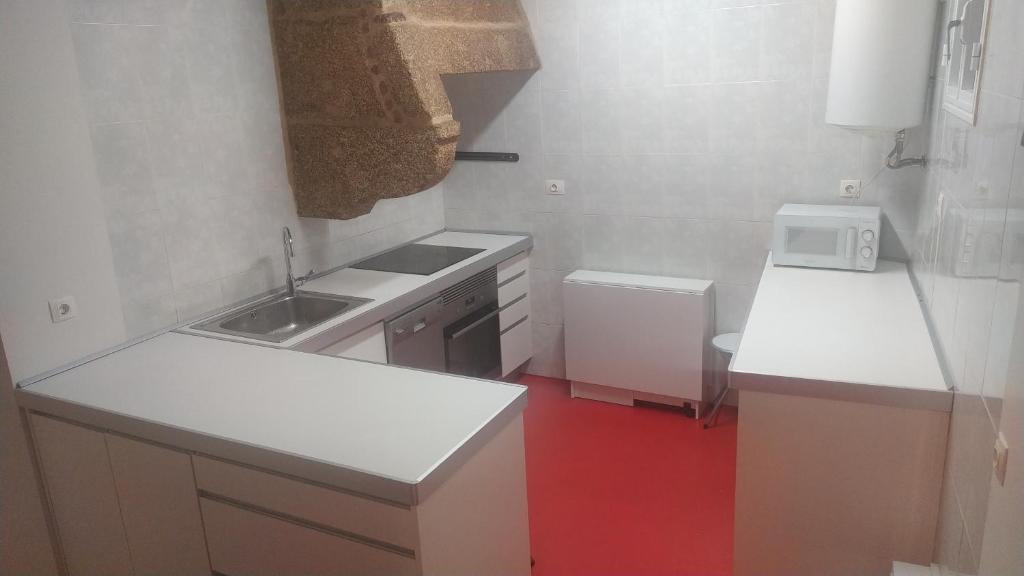 Kuchyňa alebo kuchynka v ubytovaní Precioso apartamento acogedor en el centro de Vigo