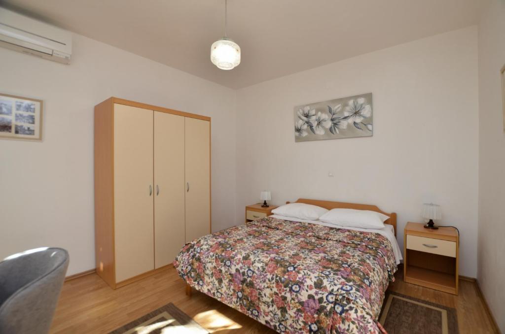 Posteľ alebo postele v izbe v ubytovaní Apartment Gianfranko
