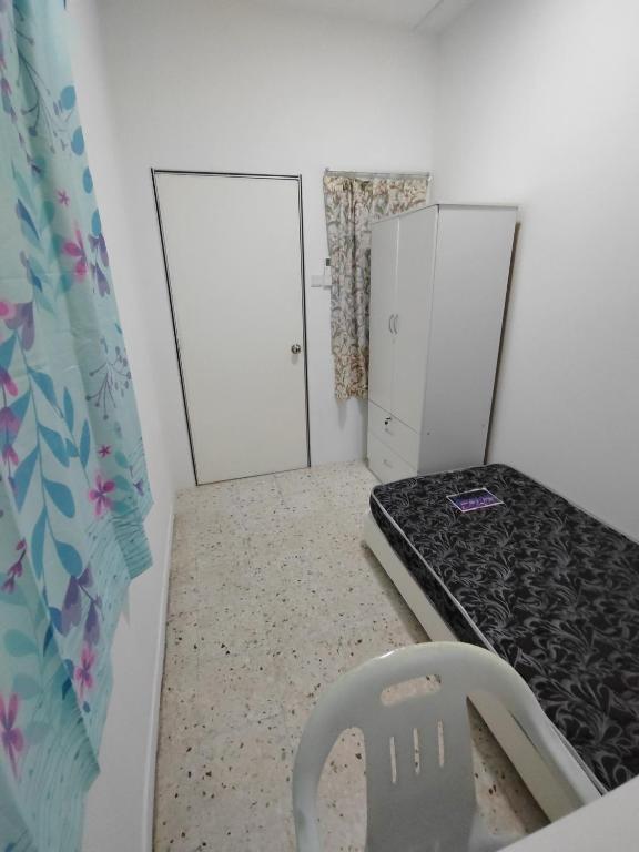 Voodi või voodid majutusasutuse GP Hostel Penang toas