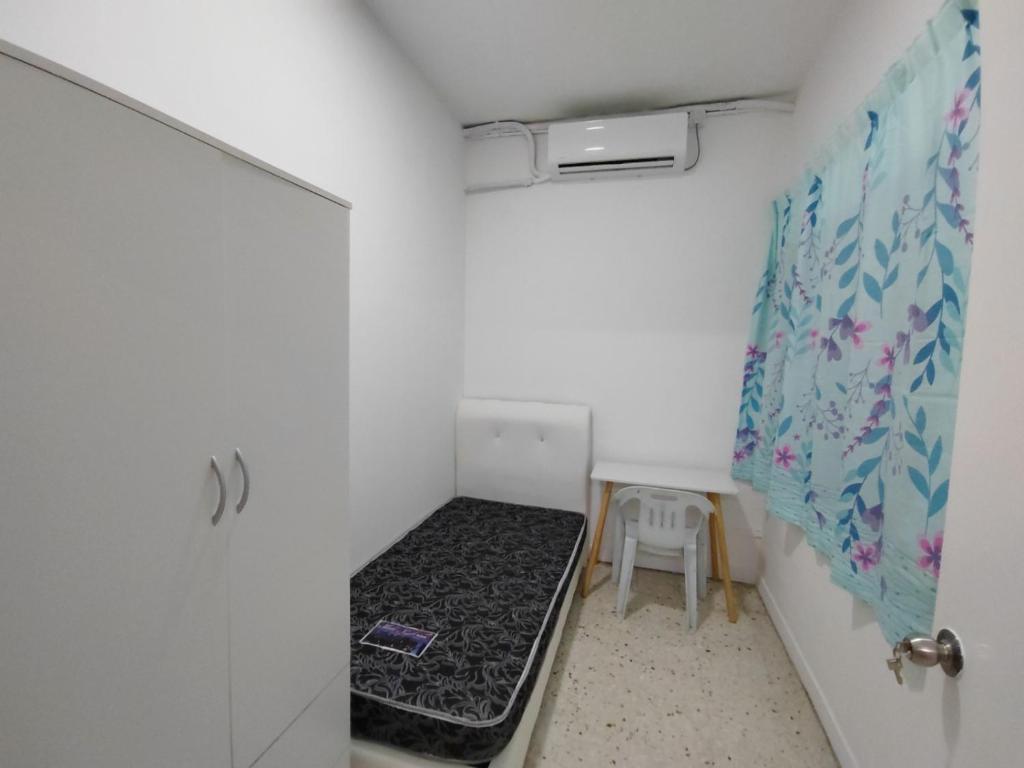 Voodi või voodid majutusasutuse GP Hostel Penang toas