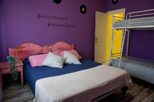 Postel nebo postele na pokoji v ubytování Hostal Paraíso Tenerife