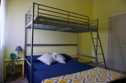Postel nebo postele na pokoji v ubytování Hostal Paraíso Tenerife
