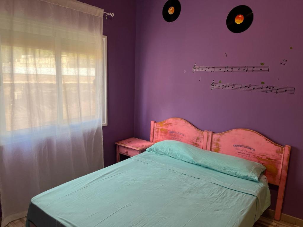Postel nebo postele na pokoji v ubytování Hostal Paraíso Tenerife
