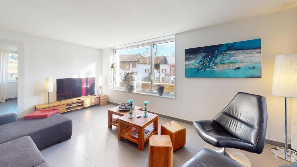 TV a/nebo společenská místnost v ubytování Family Apartment Sot Lantsch-Lenzerheide for 6 persons