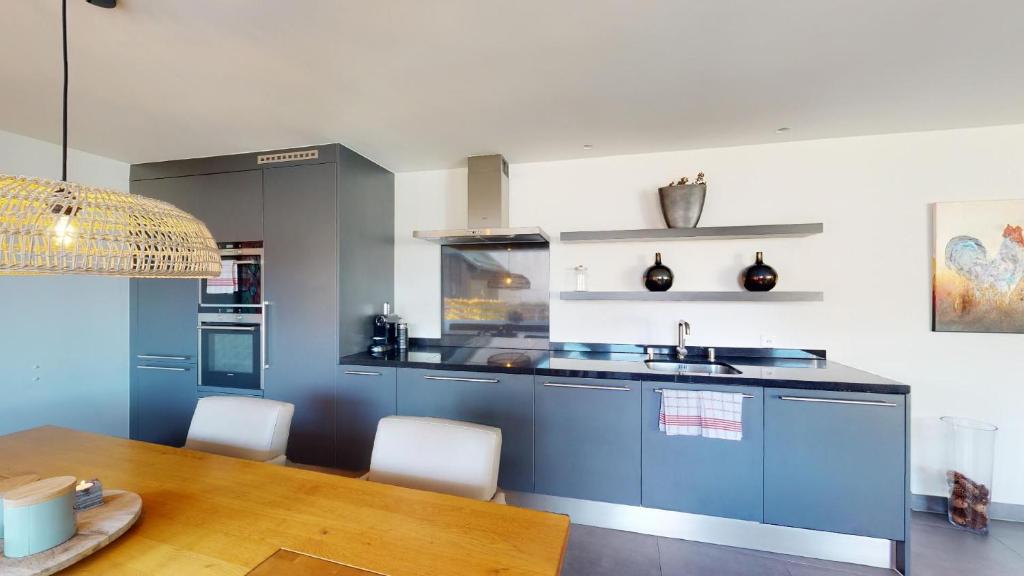 Kuchyň nebo kuchyňský kout v ubytování Family Apartment Sot Lantsch-Lenzerheide for 6 persons