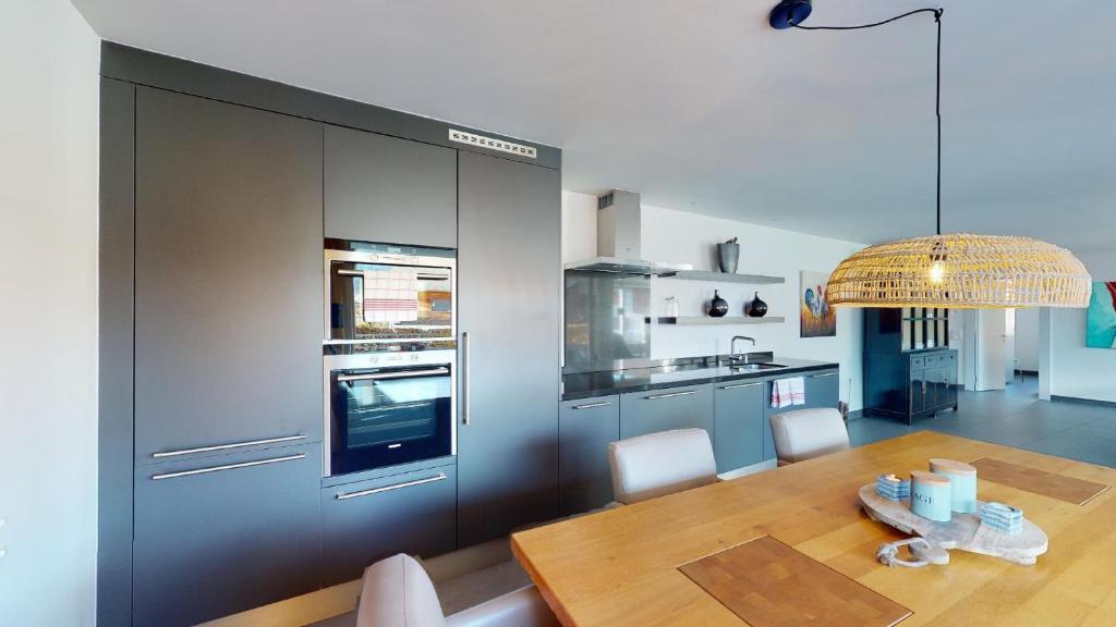 Kuchyň nebo kuchyňský kout v ubytování Family Apartment Sot Lantsch-Lenzerheide for 6 persons