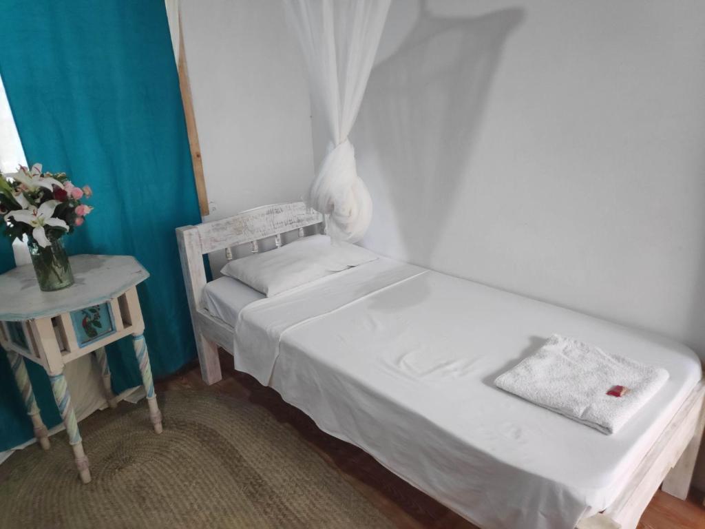 Postel nebo postele na pokoji v ubytování Sunny garden rooms Watamu