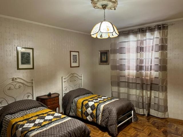 Postel nebo postele na pokoji v ubytování Villa Ines