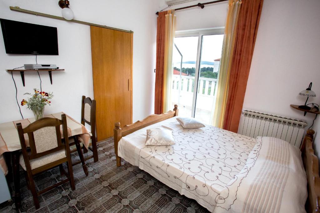 Posteľ alebo postele v izbe v ubytovaní Apartment Julio