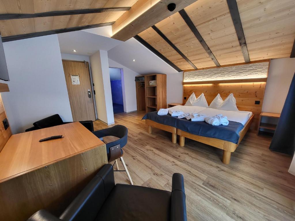 Postel nebo postele na pokoji v ubytování Hotel Europa