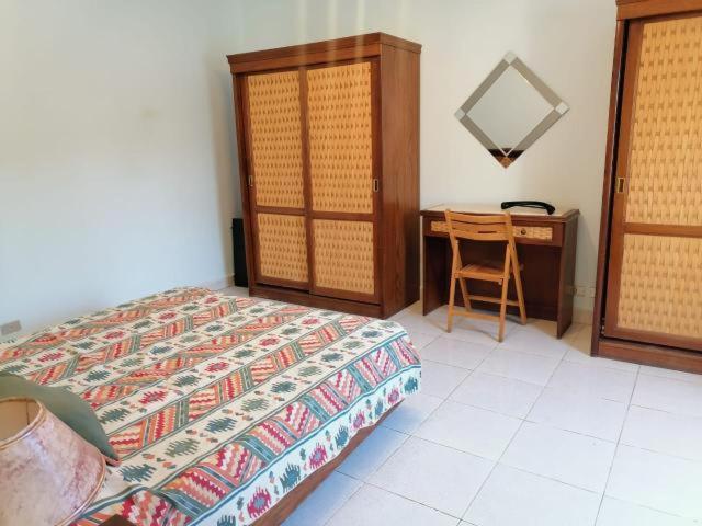 Katil atau katil-katil dalam bilik di Palm valley residence
